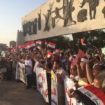 Protestors at Tahrir Square in Baghdad on 13 July