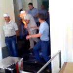 Victor Trifonov commiting an act of self-immolation