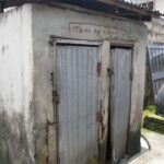 Communal toilet/shower facilities at a worker's home. 